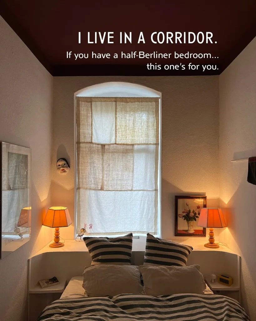 Narrow apartment bedroom with a bed positioned close to the walls and a slim walking path.